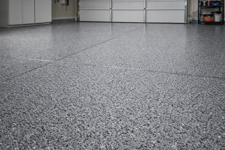 Concrete garage floor resurfacing with protective epoxy coating